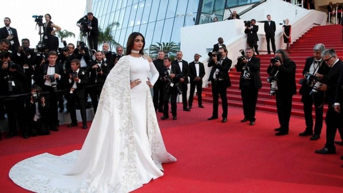 Check out: Sonam Kapoor in a bespoke all-white floor sweeping gown a Cannes